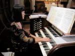 Kathy Au Crosier plays the organ at Regnal Hall’s memorial&nbsp;service.