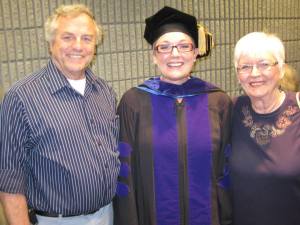 Proud parents, Norm and Pat Sabin, with daughter Daris